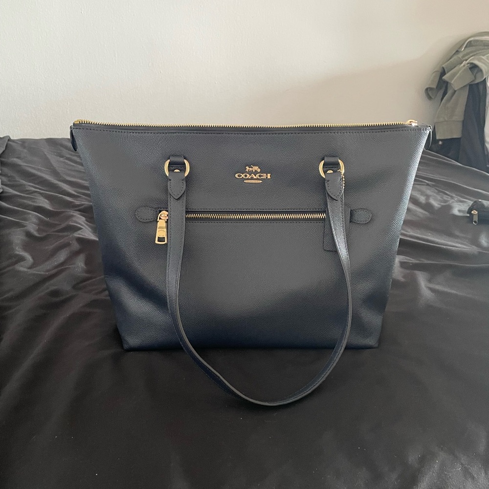 Coach Black Shoulder Bag with Gold Hardware and Structured Design